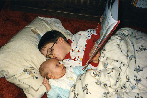 Will (5) and Christina (2 months) during a relaxed day of our early homeschooling, 1990.  