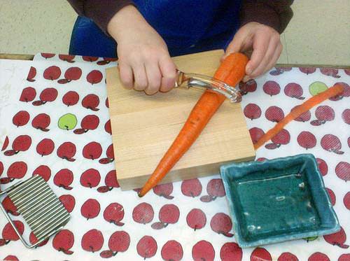 Peeling Carrots (Photo from The Moveable Alphabet)