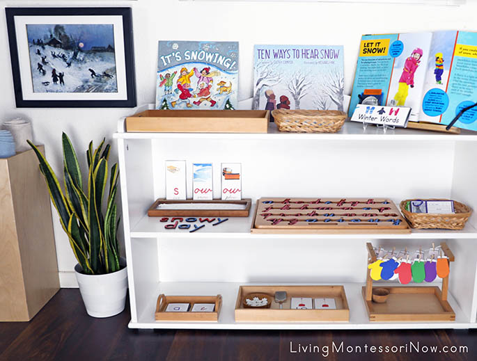 Montessori Shelves with Snowy Day Themed Activities and Sledging Art Print
