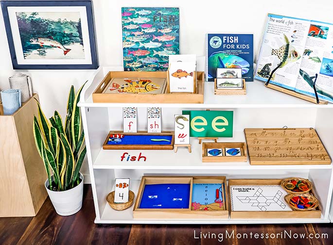 Montessori Shelves with Fish-Themed Activities and Winslow Homer Art Print
