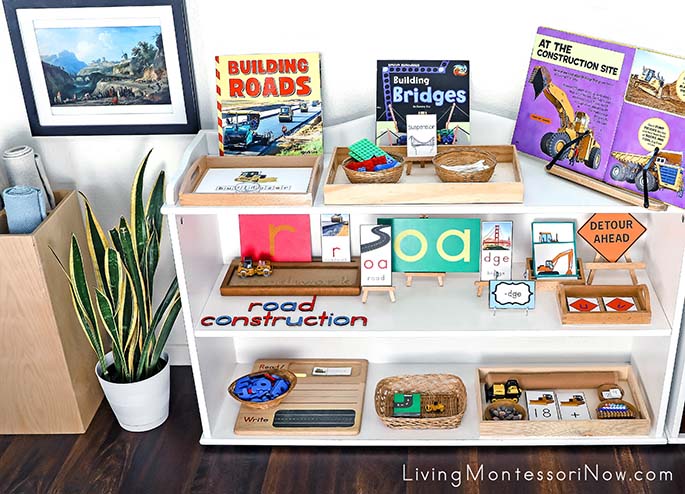Montessori Shelves with Road Construction Themed Activities and Claude-Joseph Vernet Art Print